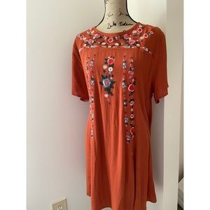 Orange dress with wildflower detailing. NWOT.